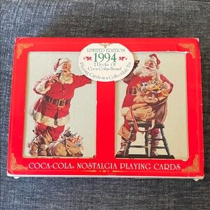 Limited edition 1994 2 decks of Coca-Cola brand playing cards in collectible tin
